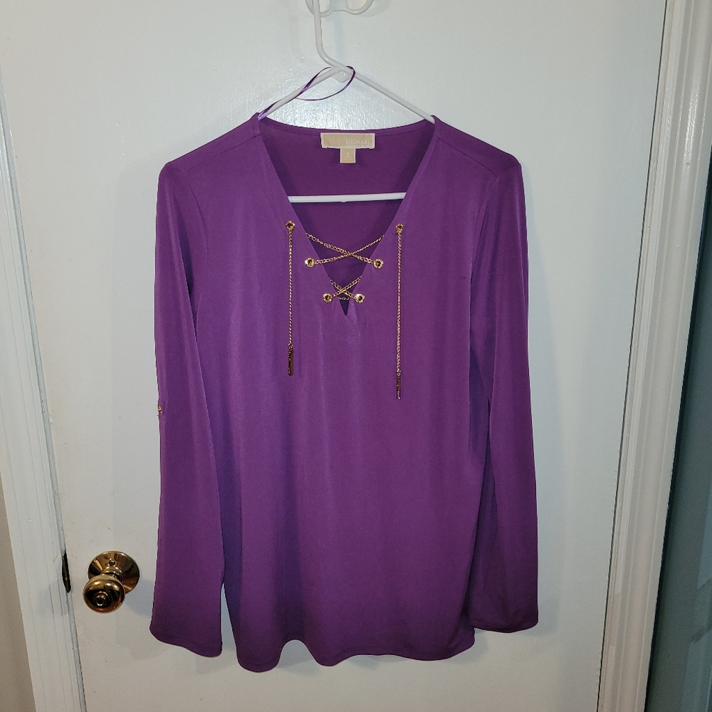Lady size small blouse fits like a medium